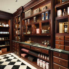 A luxurious pantry with wooden shelves, stocked with gourmet food products, snacks, and niceties, illuminated by warm lighting, creating a cozy and elegant shopping experience atmosphere.