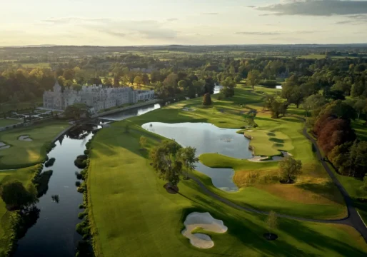 Aerial view of Adare Manor estate and championship golf course at sunset, Gothic Revival 5-star luxury resort in Adare, County Limerick, Ireland (spa, fine dining)